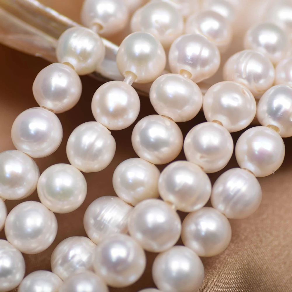10-11mm 4A Large White Round F - огляд і ціна Natural Freshwater Pearl Strand Loose Beads