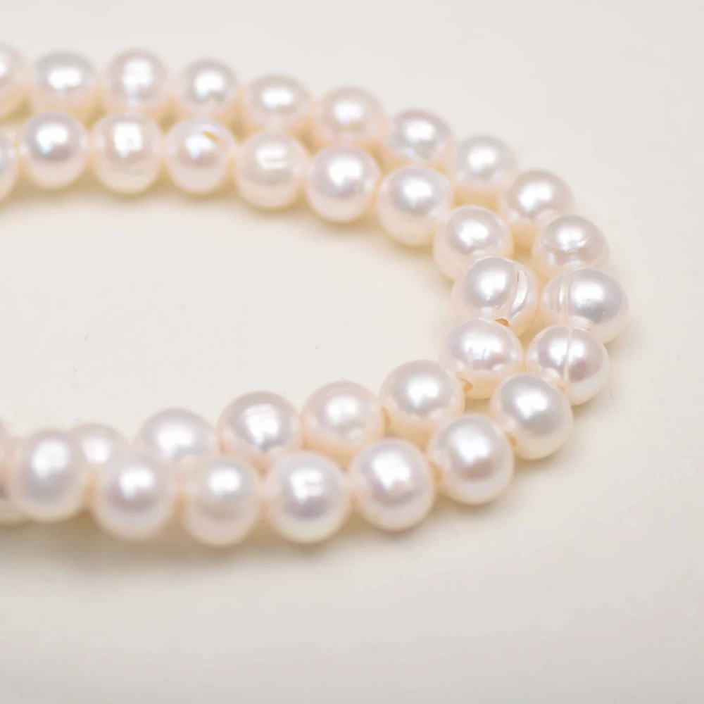 10-11mm 4A Large White Round F - огляд і ціна Natural Freshwater Pearl Strand Loose Beads