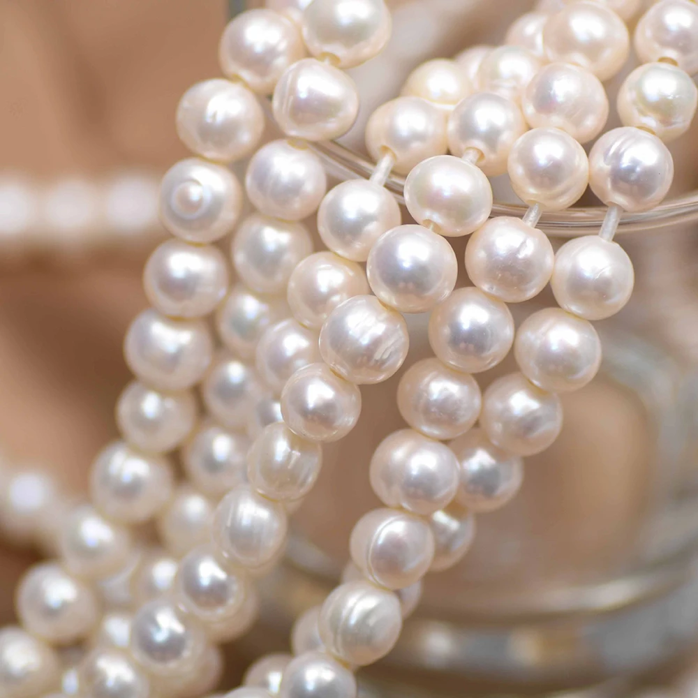 10-11mm 4A Large White Round F - огляд і ціна Natural Freshwater Pearl Strand Loose Beads
