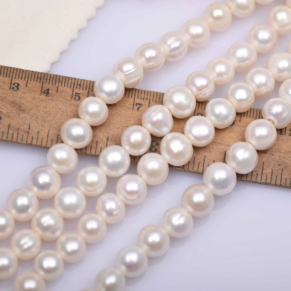 10-11mm 4A Large White Round F - огляд і ціна Natural Freshwater Pearl Strand Loose Beads
