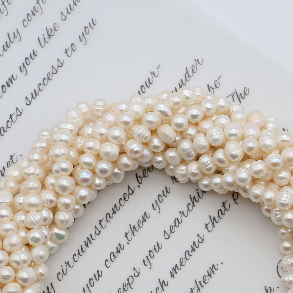 White Round Natural Freshwater - огляд і ціна Natural Freshwater Pearl Strand Loose Beads
