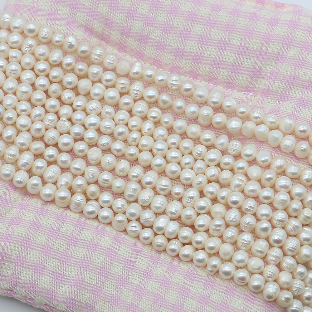 White Round Natural Freshwater - огляд і ціна Natural Freshwater Pearl Strand Loose Beads