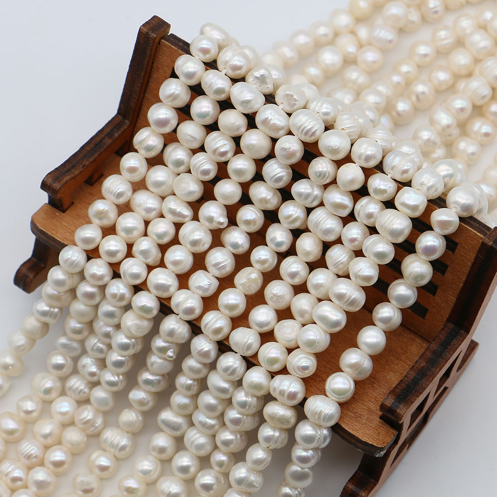 White Round Natural Freshwater - огляд і ціна Natural Freshwater Pearl Strand Loose Beads