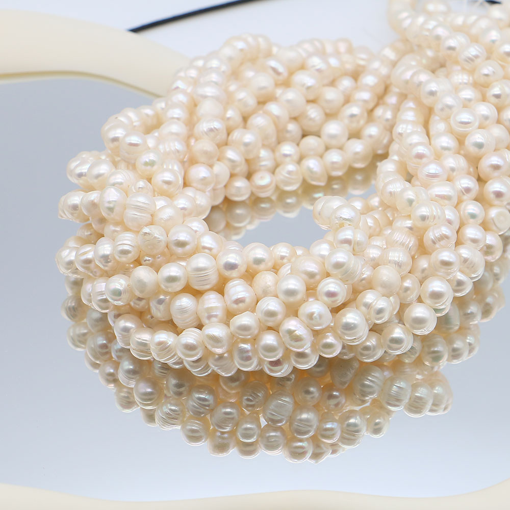White Round Natural Freshwater - огляд і ціна Natural Freshwater Pearl Strand Loose Beads